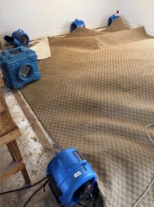 Mitigation fans drying out water damage in a home in Redmond, Or