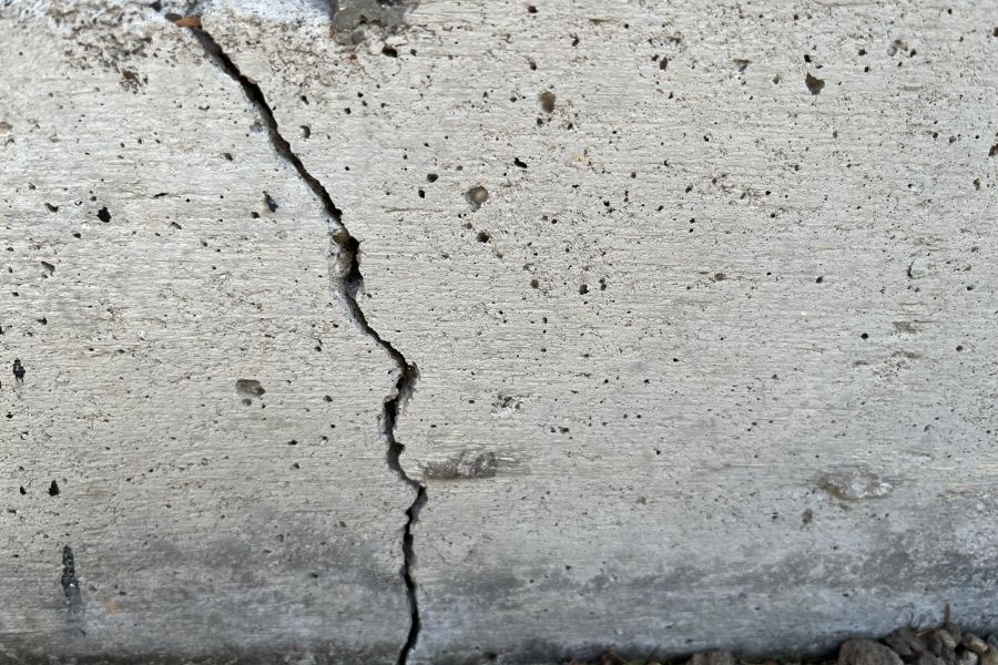 Aging home foundation in Central Oregon showing cracks where water can enter