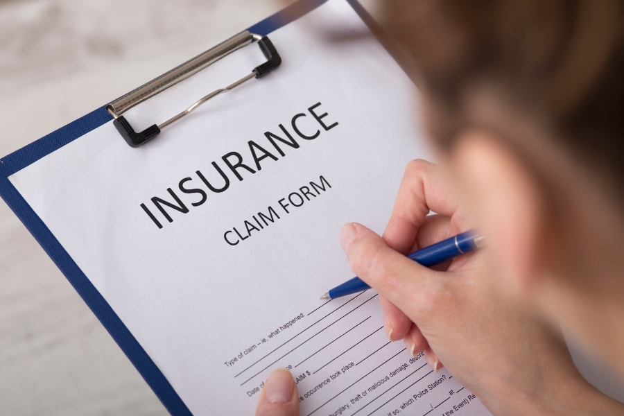 Insurance claim form and fire damage assessment documentation for a Central Oregon homeowner