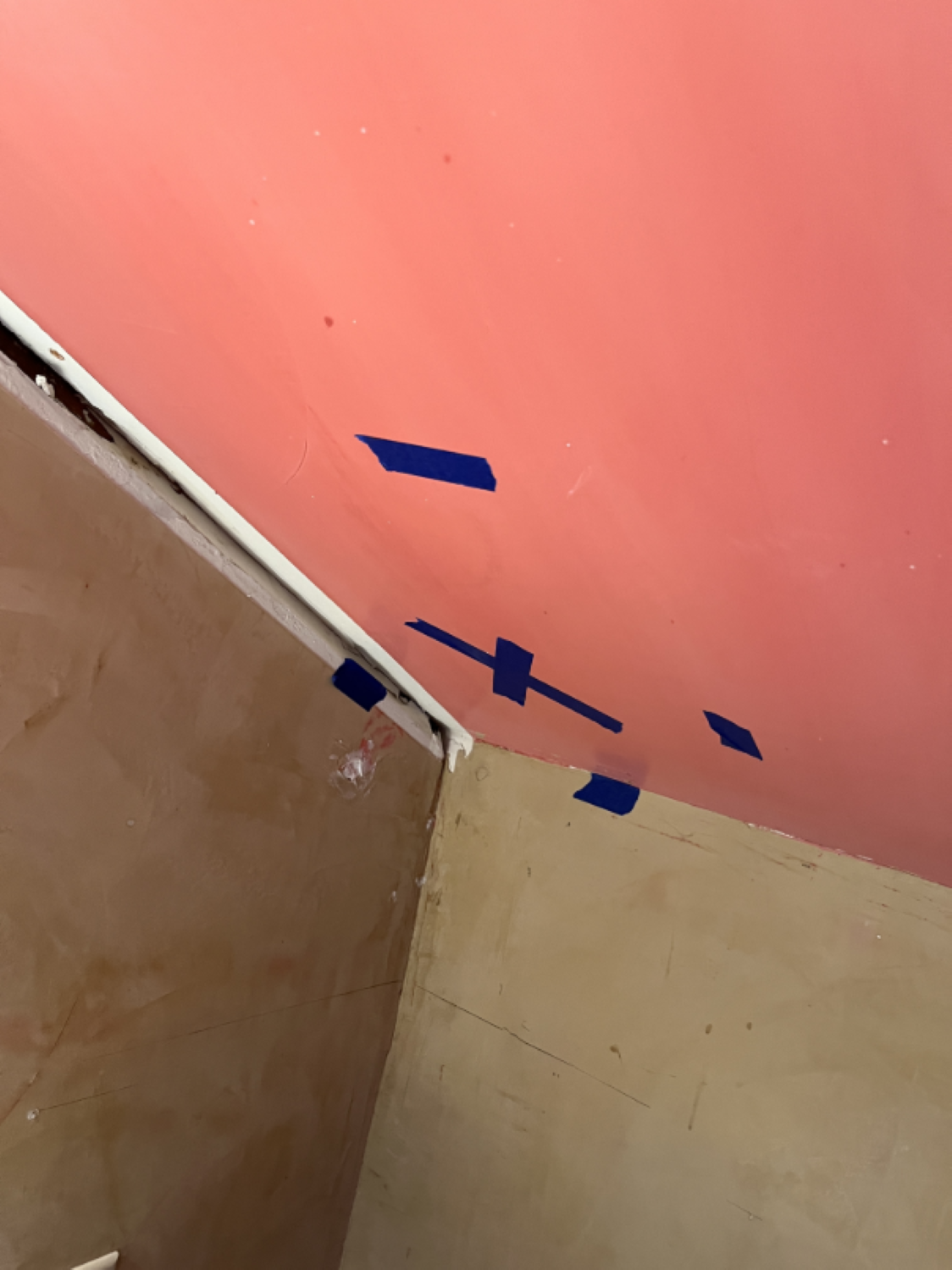 Water-stained ceiling damage caused by roof leak in residential property