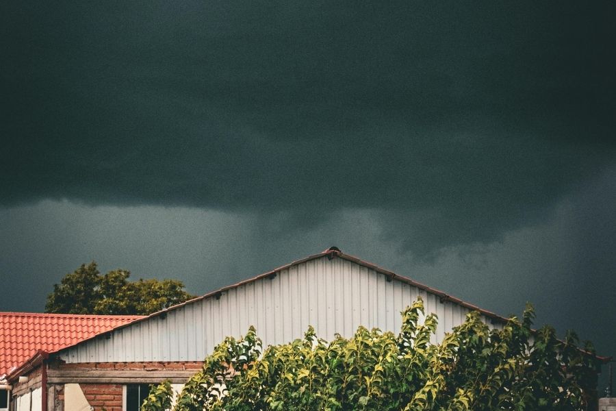 Dark storm clouds forming over a Central Oregon home during summer storm season