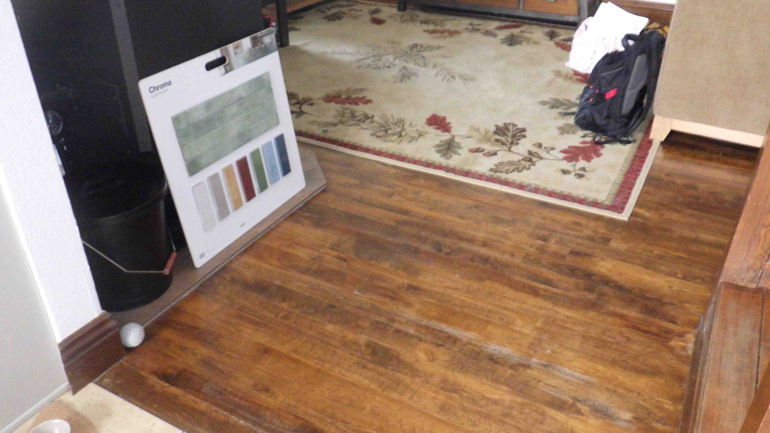 Floor damage from water migrating down through the structure after a roof leak