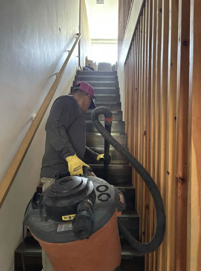 Wet vacuum used for emergency water extraction in a Bend condo kitchen